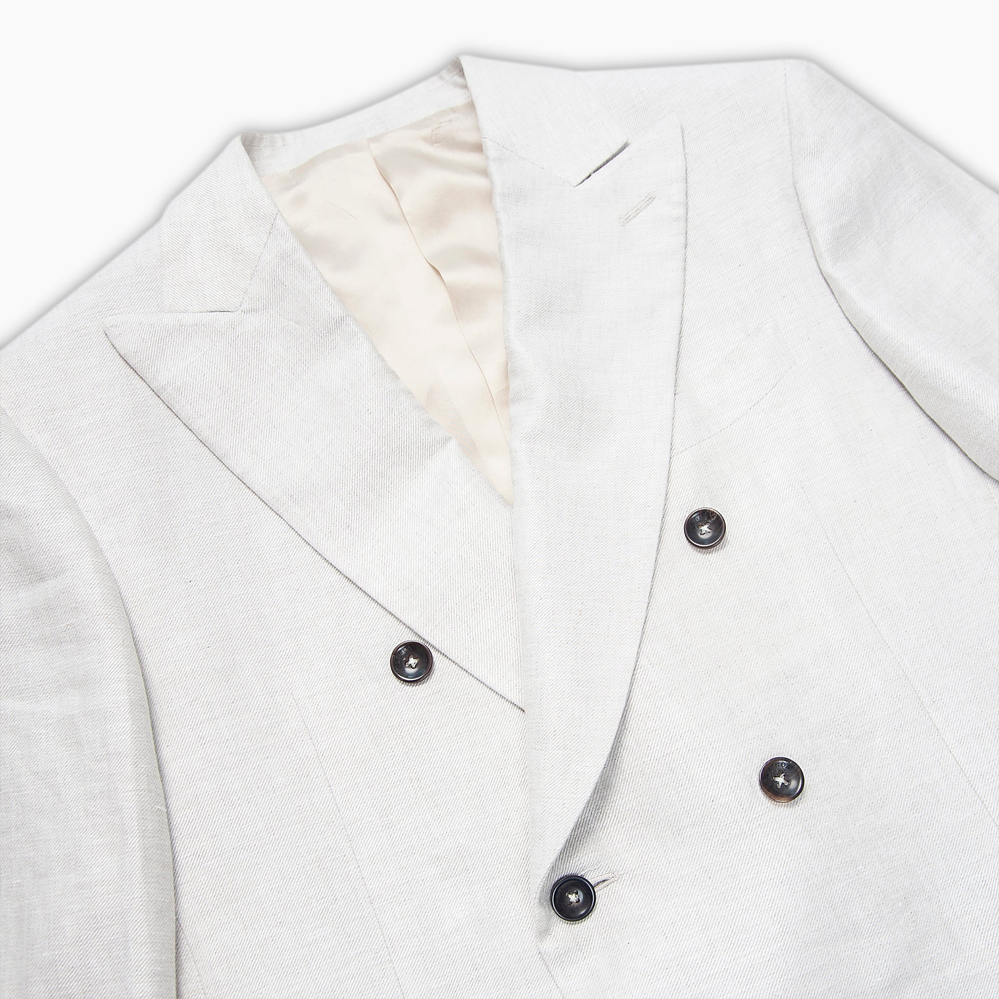 Beckett linen blazer with double-breasted style.