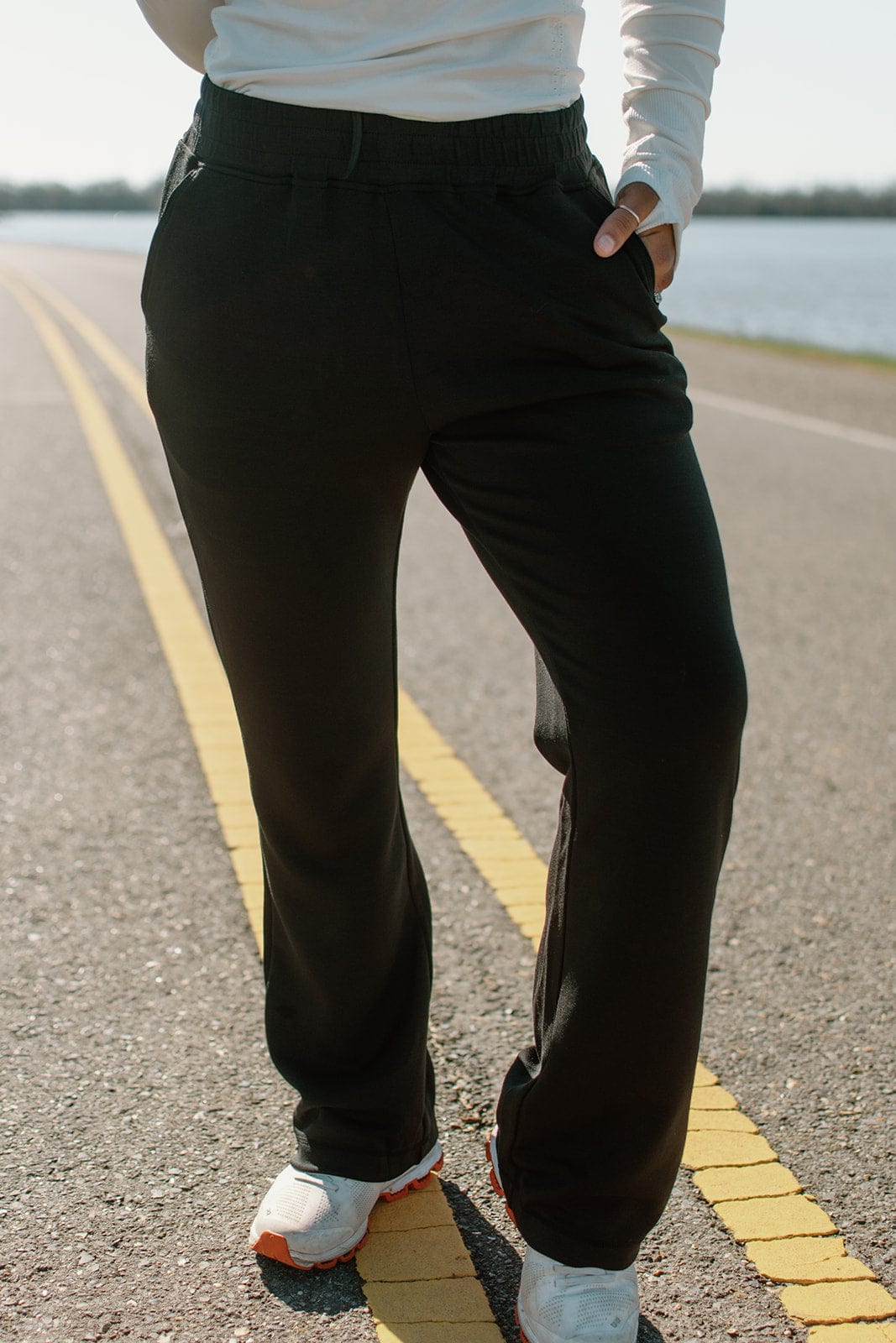 Black sweatpants with high waist.