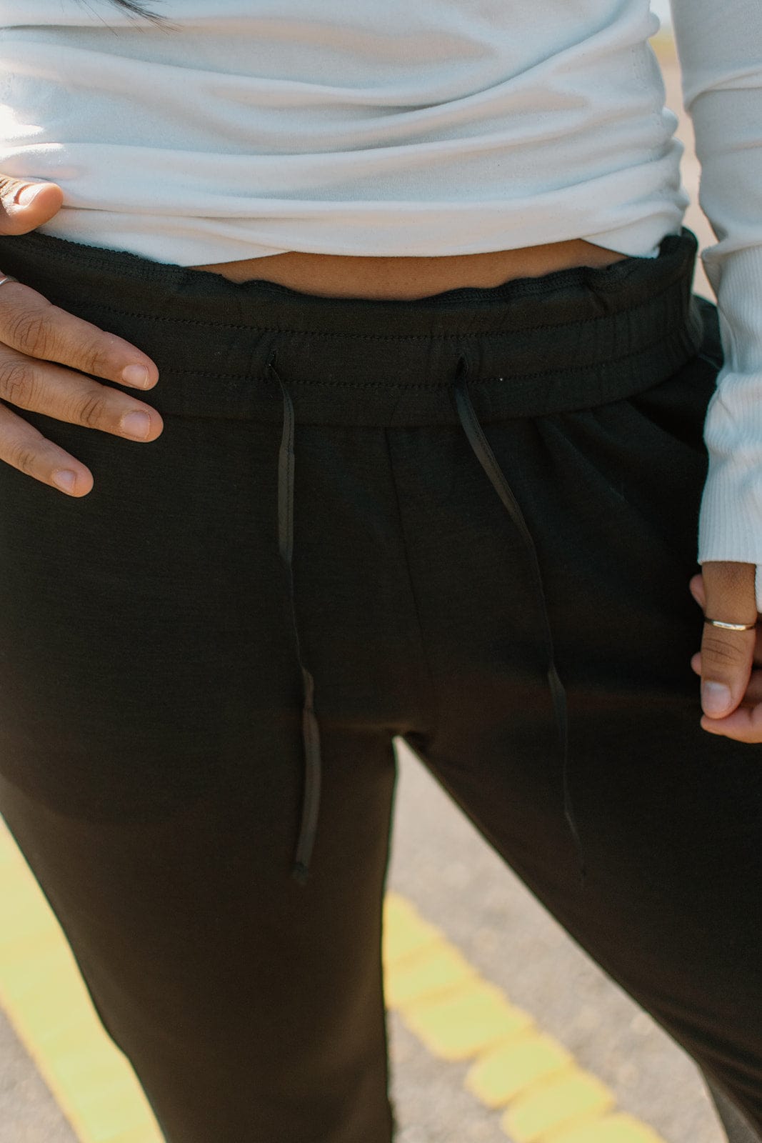 Black sweatpants with high waist.