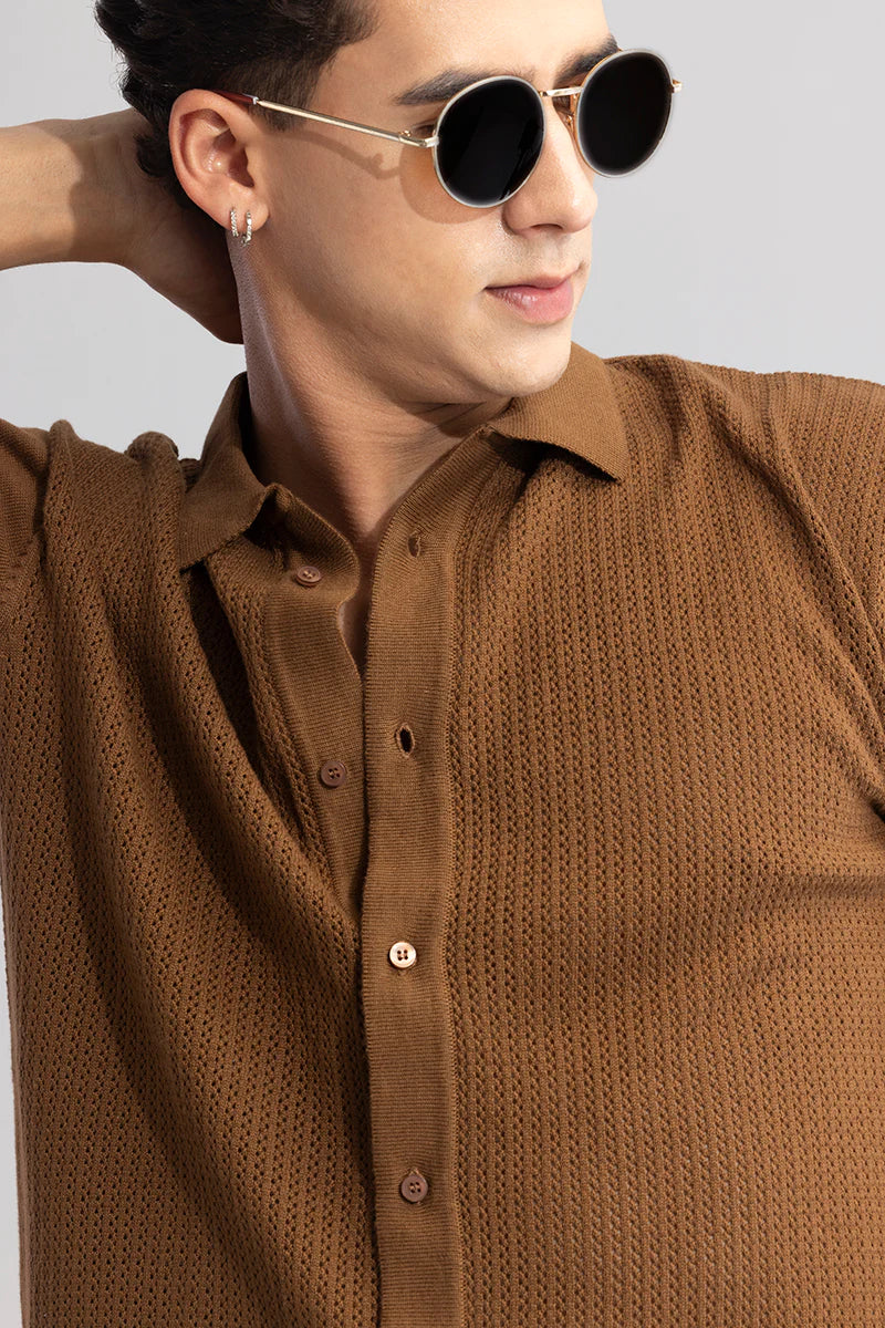 Knit brown shirt with serene elegance.