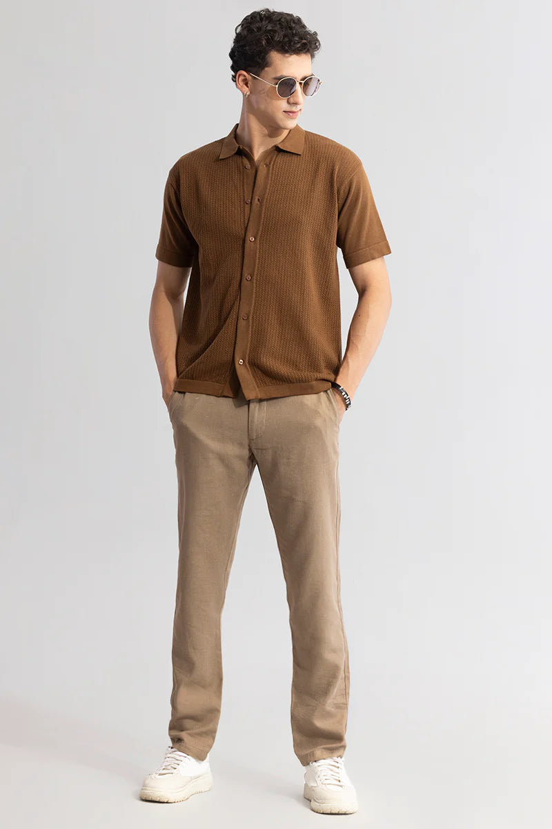 Knit brown shirt with serene elegance.