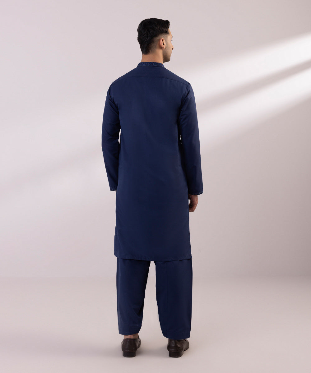 Machine embroidered easy-care suit