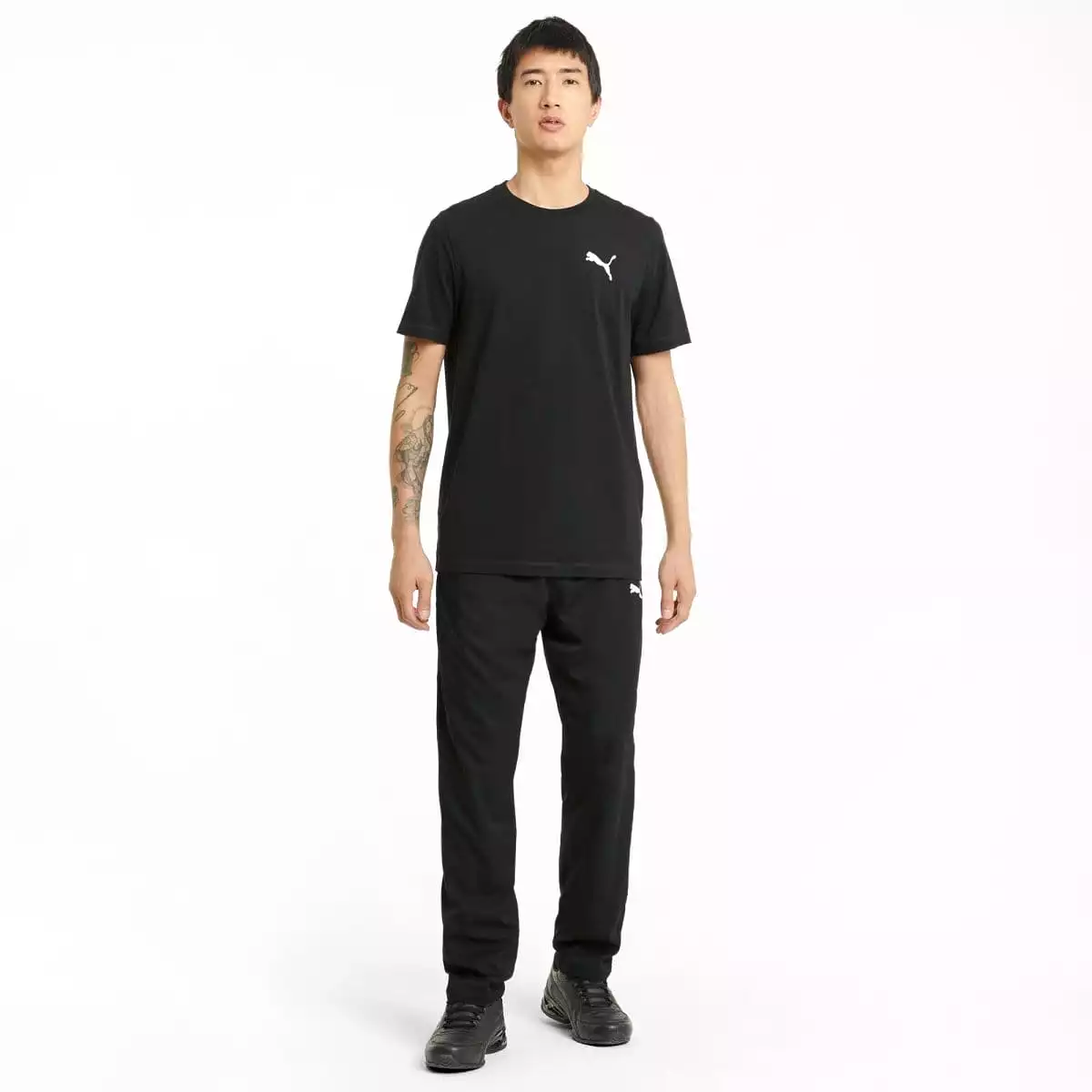 Puma black trackpants for men in an active woven style.