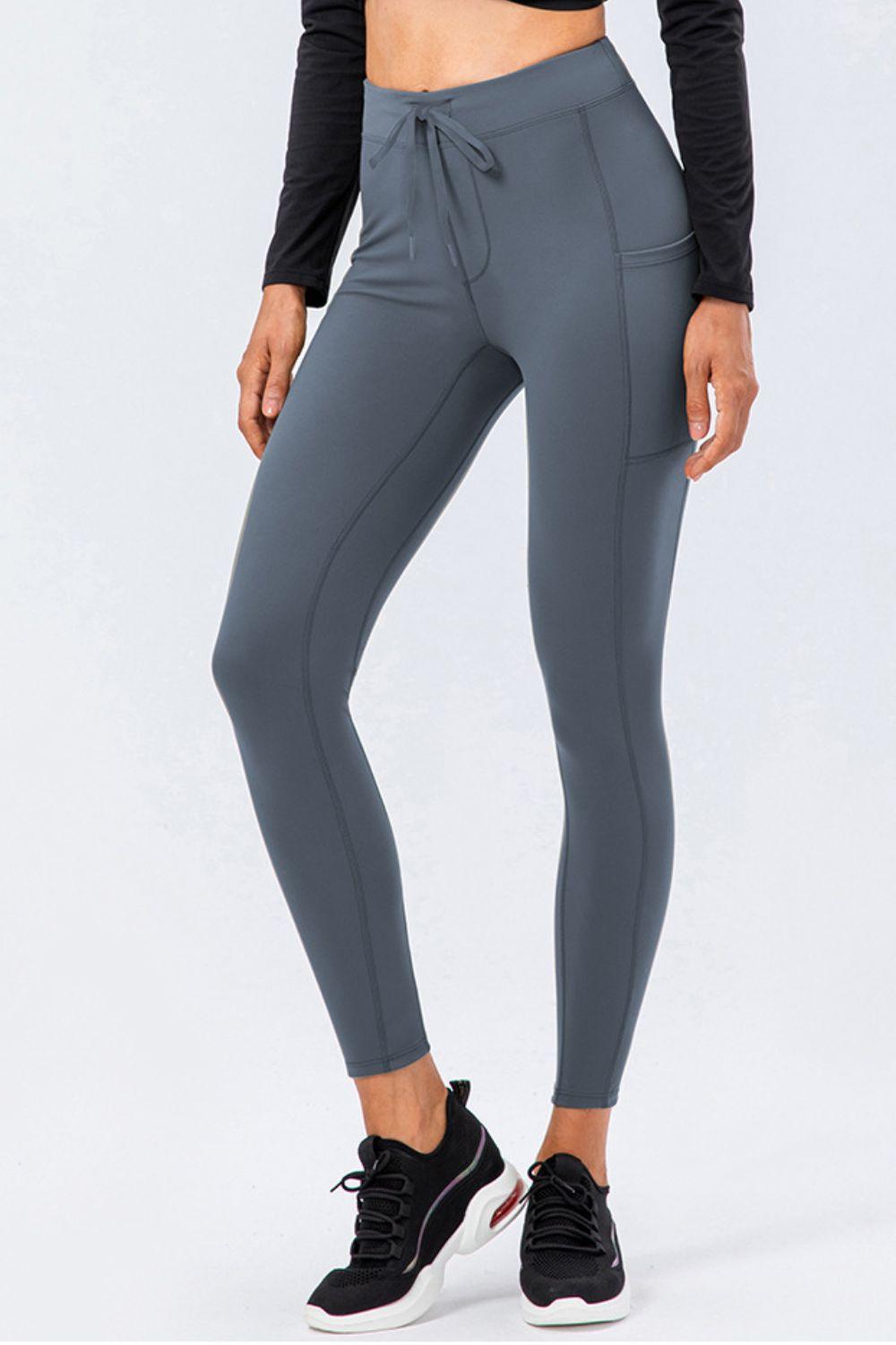 Sports Leggings with Drawstring and Side Pockets.