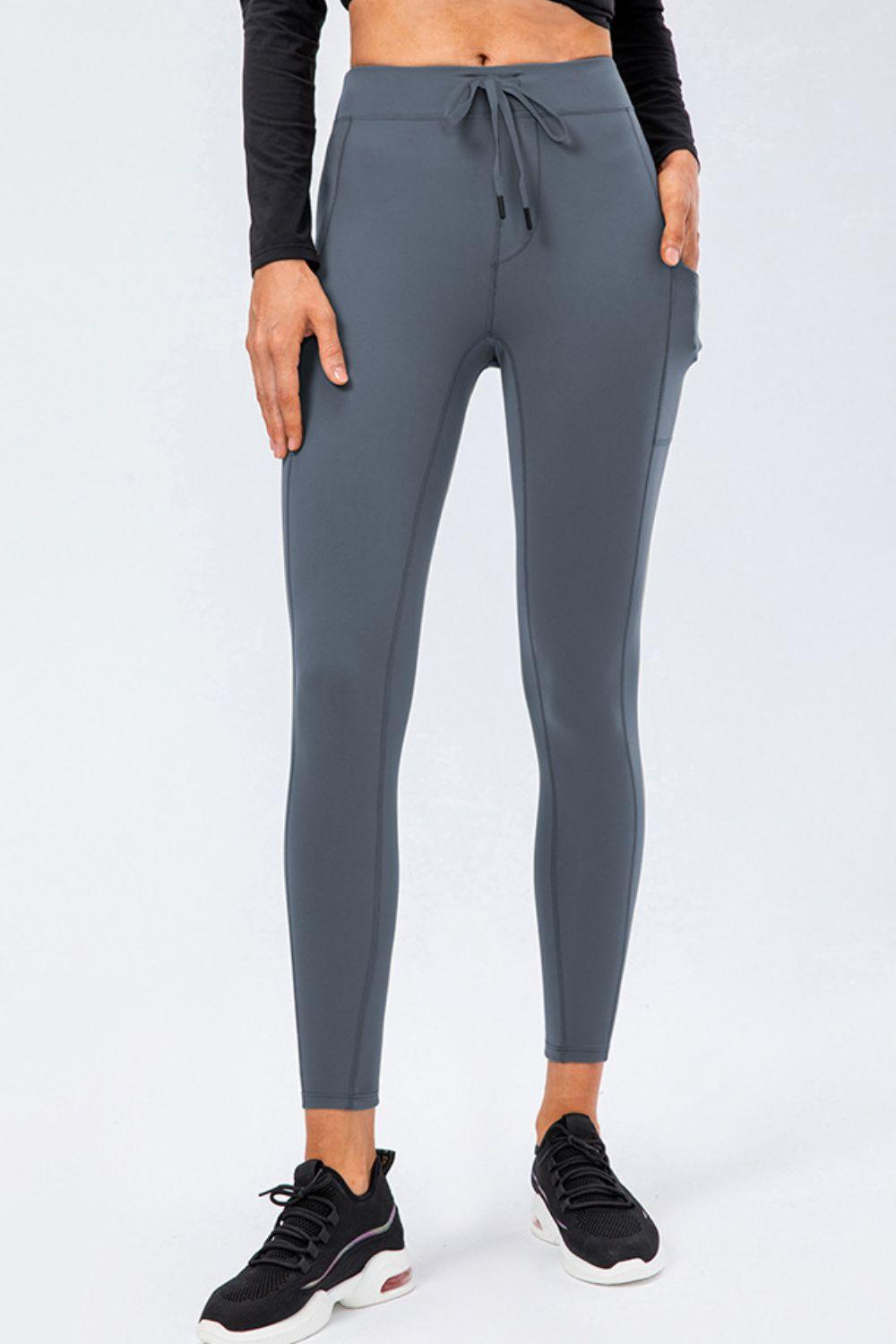 Sports Leggings with Drawstring and Side Pockets.