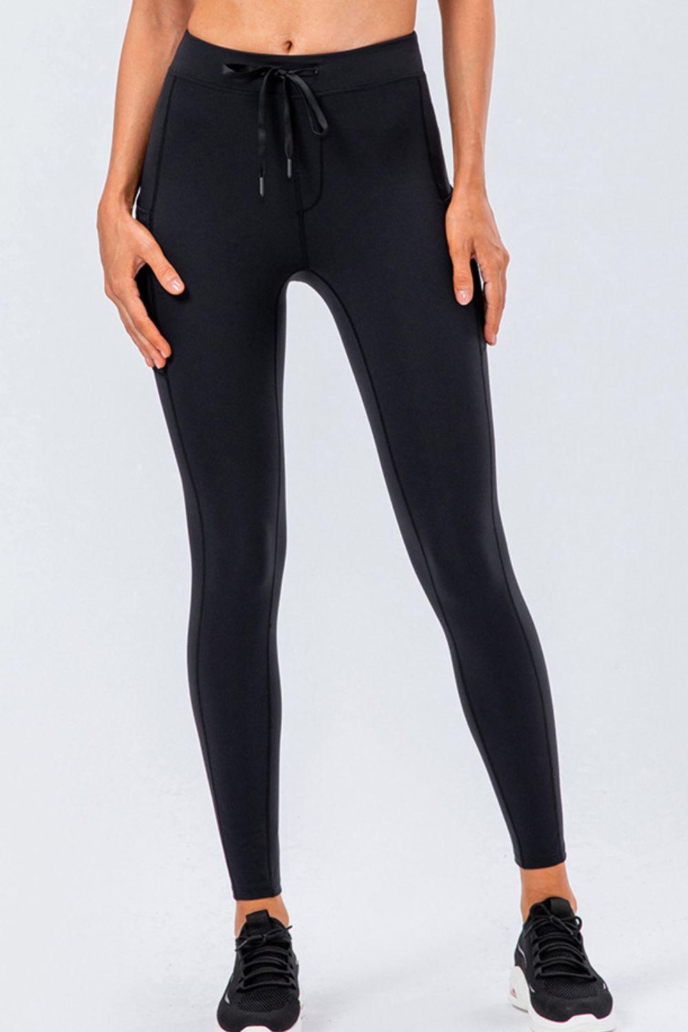 Sports Leggings with Drawstring and Side Pockets.