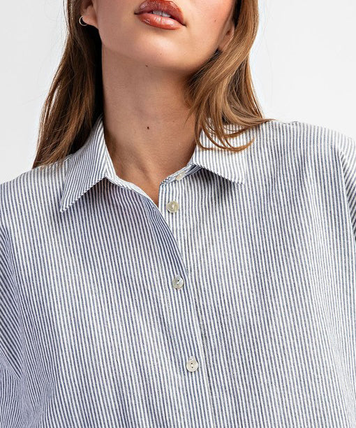 Navy striped button-down blouse.