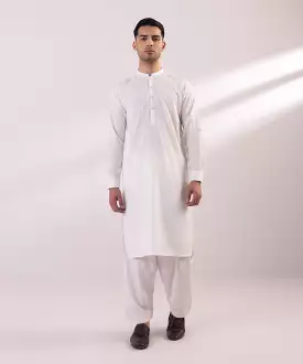 Wash and wear suit with embroidered design.